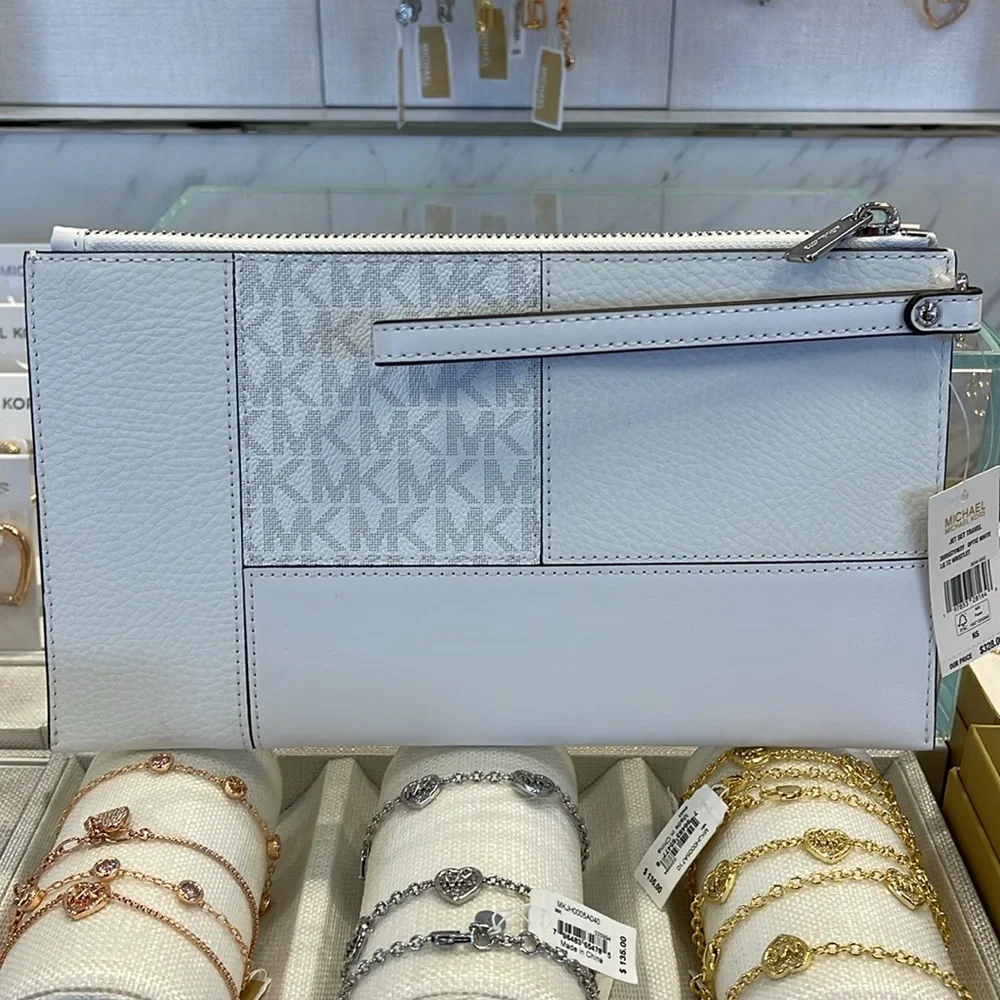 Michael Kors Jet Set Travel Large Studded Patchwork and Signature Logo Wristlet